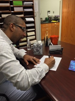 Commisioner Signing for Housing Authority